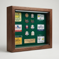 Walnut display case with green felt and golf volunteer badges and pins - The Service Showcase