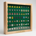 Maple display case filled with rows of colorful golf tournament pins - The Pin Collector